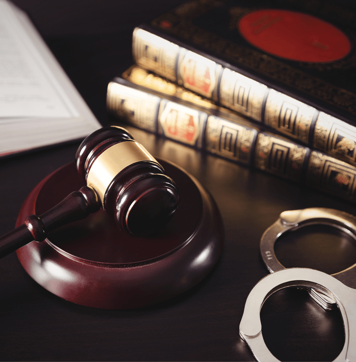 Gavel and legal books on desk