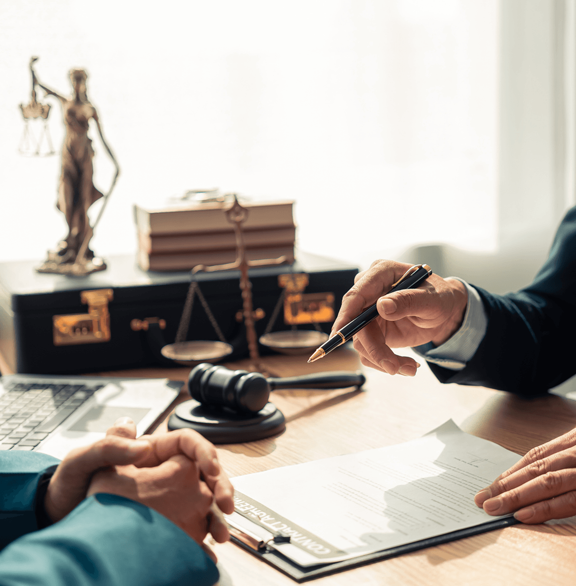 Lawyer discussing contract details with client